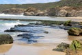 Eroded and weathered coal seam exposed on Ghosties Beach Catherine Hill Bay New South Wales Australia Royalty Free Stock Photo