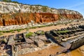 Colorful white-red cliffs in Hunstanton UK,boat wreck Royalty Free Stock Photo