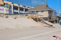 Erosion of the sand of the beach with destruction of a asphalt path in front of an Atlantic City Casino after a hurricane and