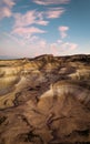 Erosional arid features in the Valley of the Moon at sunset. Vertical panoramic view