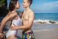 Erotic couple at the beach, sea view. Traveling at Bali. Royalty Free Stock Photo