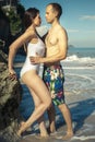 Erotic couple at the beach, sea view. Traveling at Bali. Royalty Free Stock Photo