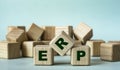 ERP - acronym on wooden cubes on a light background
