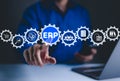 ERP - Enterprise Resource Planning Concept. Digital interface of ERP icons for business management, scheduling, resource