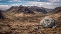 Erratic rock above Glencoe Valley in Lochaber Royalty Free Stock Photo