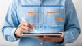 Businessman Using Tablet with Gantt Chart Representing Project Management and Scheduling Efficiency Royalty Free Stock Photo