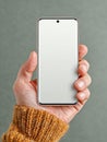 Modern Smartphone Held in Hand with a Blank Screen Ready for Interaction Royalty Free Stock Photo