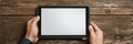 Error 503 Displayed on a Tablet Held in Hands on a Clean Wooden Surface, Empty Space at the Top for Additional Content Royalty Free Stock Photo