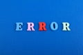 ERROR word on blue background composed from colorful abc alphabet block wooden letters, copy space for ad text. Learning Royalty Free Stock Photo