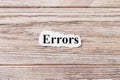 Errors of the word on paper. concept. Words of Errors on a wooden background Royalty Free Stock Photo