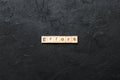 Errors word written on wood block. Errors text on cement table for your desing, concept