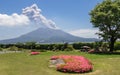 Erupted Vulcan Sakurajima covered by green Landscape. Taken from the wonderful Sengan-en Garden. Located in Kagoshima, Kyushu, Royalty Free Stock Photo