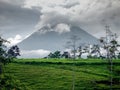 Erupting Arenal Volcano masked in clouds Royalty Free Stock Photo