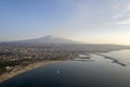 Erupting Etna volcano aerial view at sunrise from airplane Royalty Free Stock Photo