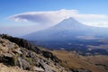 Erupting Popocatepetl volcan seen from volcan Iztaccihuatl in Izta-Popo Zoquiapan National Park, Mexico Royalty Free Stock Photo