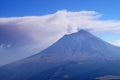 Erupting Popocatepetl volcan seen from volcan Iztaccihuatl in Izta-Popo Zoquiapan National Park, Mexico Royalty Free Stock Photo