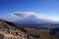 Erupting Popocatepetl volcan seen from volcan Iztaccihuatl in Izta-Popo Zoquiapan National Park, Mexico Royalty Free Stock Photo
