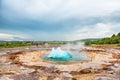 Eruption of Strokkur Geysir, Golden circle in Iceland Royalty Free Stock Photo