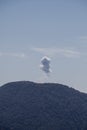 Eruption of volcano Fuego hidden behind volcan Toliman, Guatema