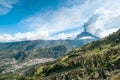 Eruption of a volcano Tungurahua and town Banos de Agua Santa Royalty Free Stock Photo