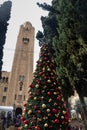 The Jerusalem International YMCA, a city landmark, built in early years of the 20th century and a Christmas tree in front of t