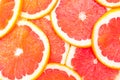 Erved fresh grapefruit composition isolated over the white background, top view