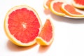 Erved fresh grapefruit composition isolated over the white background, top view