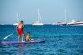 People in paddle surf in Es Pujols beach in Formentera, Spain in the summer of 2021 Royalty Free Stock Photo