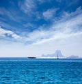 Es Vedra Ibiza silhouette with boats Formentera view