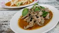 Esan`s food, Scalding Liver pork with spicy garnish in dish on