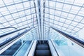 Escalator at the airport PARIS Charles de Gaulle blue colored. Royalty Free Stock Photo