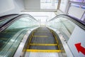 Escalator in business office building. Moving up staircase. Royalty Free Stock Photo