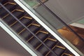 Escalator in Community Mall, Shopping Center. Moving up staircase. electric escalator. Close up to escalators. Close up floor Royalty Free Stock Photo