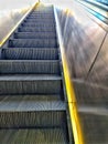 Escalator going up. Steps of an escalator. Escadas rolantes. Subway escalators.