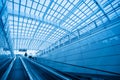 The escalator leading to the modern airport Royalty Free Stock Photo