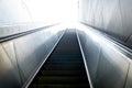 Escalator leads somewhere to the light Royalty Free Stock Photo