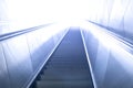 Escalator leads somewhere to the light Royalty Free Stock Photo