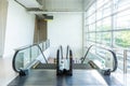 Escalator in the room with glass Royalty Free Stock Photo