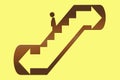 Escalator sign on a yellow background