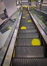 Escalator with social distancing signs