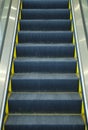 Escalator staircase steel metal vertical gray elevator Royalty Free Stock Photo