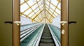 Escalator stairs open door Royalty Free Stock Photo
