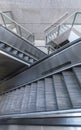 Escalator and stairway in the form of crux. Modern building abstract background