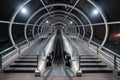 Escalator and tunnel in a train station to transfer in Shanghai City, China at night. Architectural structure of roof. Interior Royalty Free Stock Photo