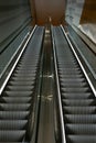 Escalators in an empty shopping mall in Singapore with motion blur effect Royalty Free Stock Photo