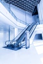 Escalators in modern building.