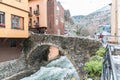 River Valira on Engordany Bridge and houses view in a snowfall day in small town Escaldes-Engordany in Andorra on January 16, 201