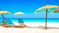 Beach chairs with umbrella and beautiful sand beach, tropical beach with white sand and turquoise wate Royalty Free Stock Photo