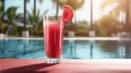 Escape to a tropical oasis as you savor flavors of a watermelon cocktail near pool, basking in warm rays of sunlit sky