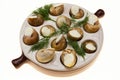 Escargot with butter and spices in a frying pan, a French delicacy of snails. Royalty Free Stock Photo